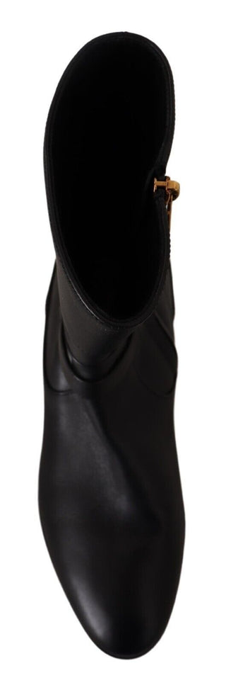 Schwarze Leder-Ballerinas mit Logo und kurzen Stiefeln