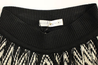 Falda asimétrica de punto blanco y negro