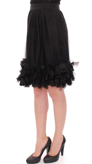 Falda transparente de seda negra, por encima de la rodilla