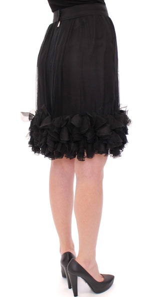 Falda transparente de seda negra, por encima de la rodilla
