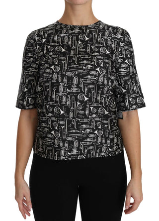 Schwarze Bluse aus Seide mit Aufdruck von Musikinstrumenten