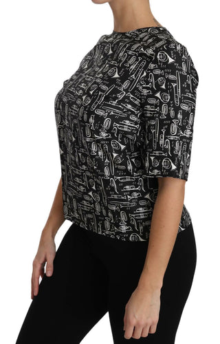 Schwarze Bluse aus Seide mit Aufdruck von Musikinstrumenten