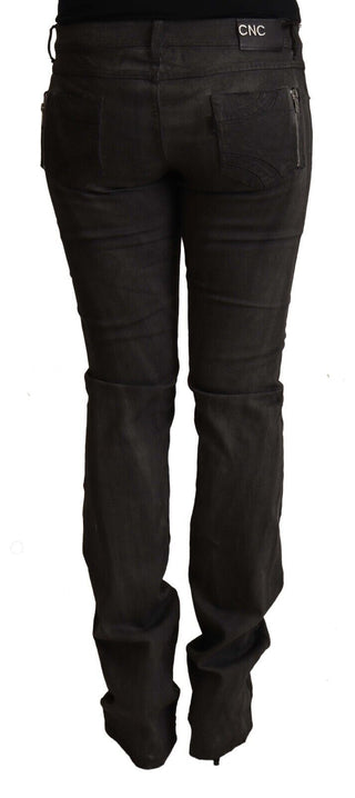 Pantalones ajustados negros de algodón de cintura media