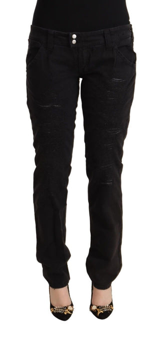 Jeans ajustados negros de algodón desgastados de cintura baja
