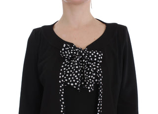 Conjunto de vestido y suéter negro de corte ajustado