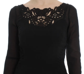 Schwarzes, figurbetontes Seidenkleid mit Stretchanteil