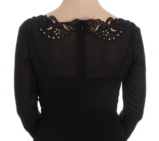 Schwarzes, figurbetontes Seidenkleid mit Stretchanteil