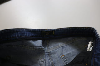 Jeans vaqueros pitillo de algodón azul lavado con cintura baja
