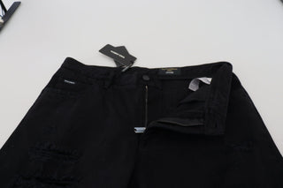 Jeans negros de algodón rotos, sueltos y de corte regular