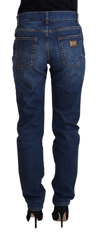 Jeans ajustados negros de mezclilla con encaje floral en la parte delantera