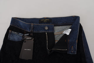 Jeans ajustados negros de mezclilla con encaje floral en la parte delantera