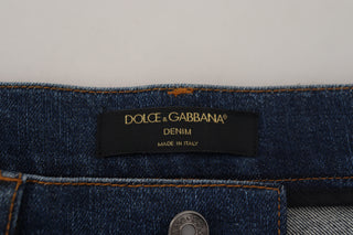 Jeans ajustados negros de mezclilla con encaje floral en la parte delantera