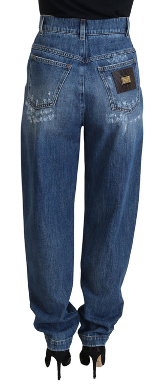 Jeans de mezclilla azul lavado de algodón con desgastados