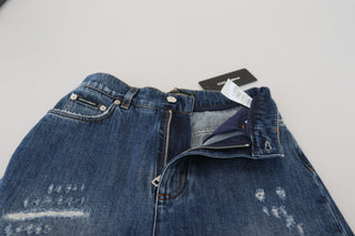 Jeans de mezclilla azul lavado de algodón con desgastados