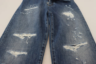 Jeans de mezclilla azul lavado de algodón con desgastados