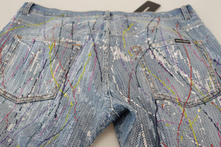 Jeans de mezclilla azules de algodón con estampado de salpicaduras de color
