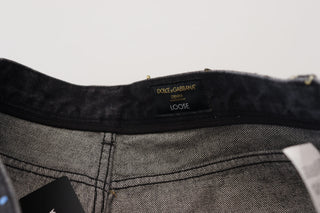 Schwarze mehrfarbig bedruckte zerrissene Jeans