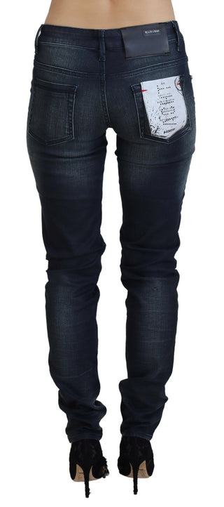 Jeans de mezclilla de algodón azul lavado de tiro bajo y ajuste slim