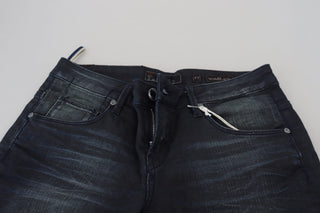 Jeans de mezclilla de algodón azul lavado de tiro bajo y ajuste slim