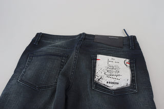 Jeans de mezclilla de algodón azul lavado de tiro bajo y ajuste slim