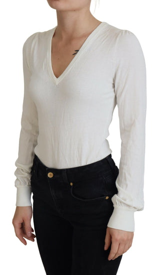 Blusa de mujer color marfil con cuello en V y mangas largas