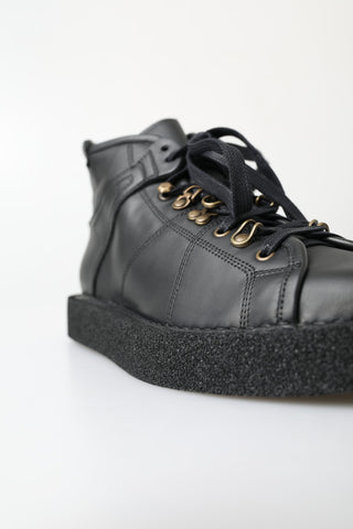 Botas negras de cuero elásticas sin cordones