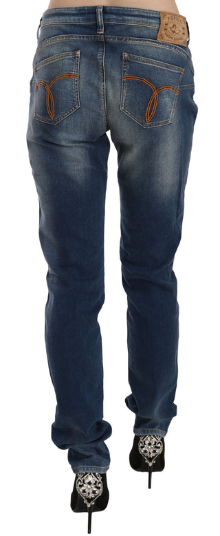 Jeans de mezclilla azul lavado de cintura media y corte ajustado