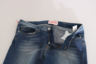 Jeans de mezclilla azul lavado de cintura media y corte ajustado