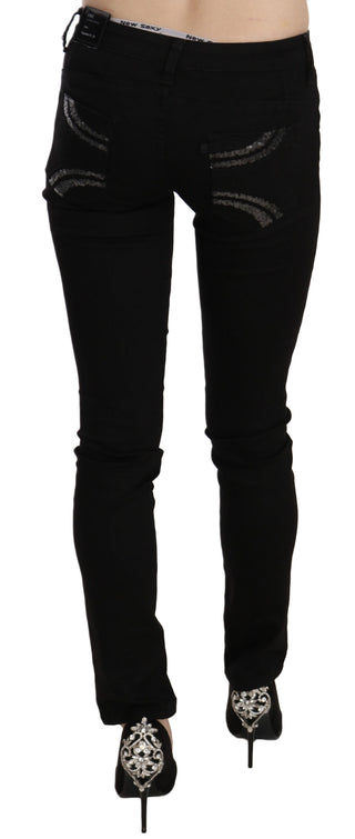 Jeans negros de cintura media con lentejuelas y corte ajustado