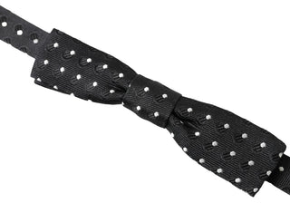 Pajarita Papillon ajustable para cuello de hombre de seda negra con lunares