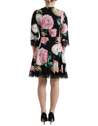 Vestido línea A negro con encaje y adornos florales  