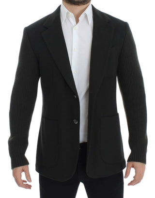 Black blazer over a white shirt on a white background