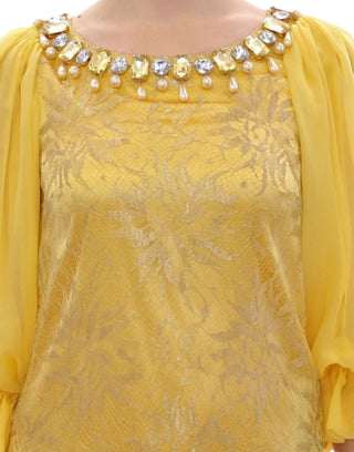 Gelbes Spitzenkleid aus Kristall
