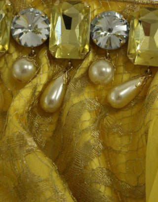 Gelbes Spitzenkleid aus Kristall