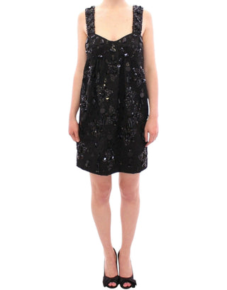 Schwarzes Kleid mit floralen Kristalleinlagen