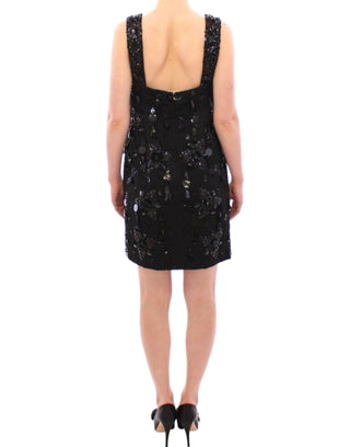 Schwarzes Kleid mit floralen Kristalleinlagen