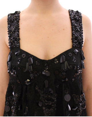 Schwarzes Kleid mit floralen Kristalleinlagen