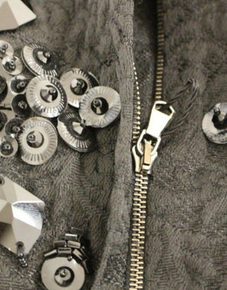 Schwarzes Kleid mit floralen Kristalleinlagen