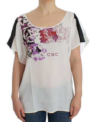 Blusa blanca con estampado de motivos