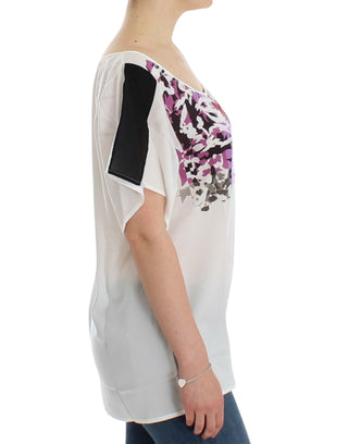 Blusa blanca con estampado de motivos