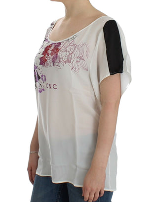 Blusa blanca con estampado de motivos