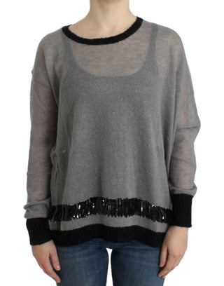 Grauer verzierter asymmetrischer Pullover