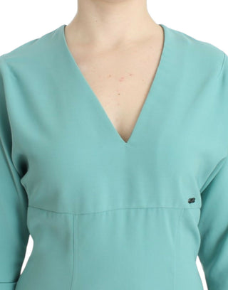 Vestido de corte recto verde con mangas 3/4