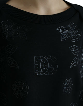 Schwarzer Pullover mit Blumen-Logo-Applikation