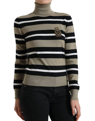 Suéter tipo pulóver multicolor con rayas, logo y cuello alto