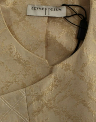 Chaqueta sin mangas de brocado beige