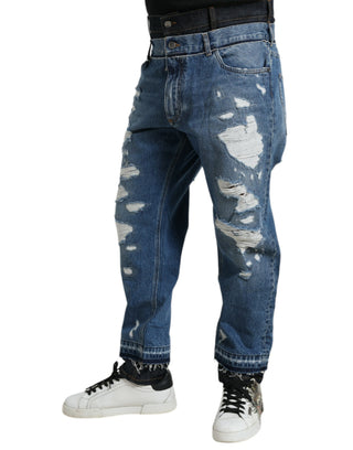 Blaue zerfetzte Baumwoll-Herrenjeans