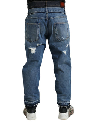 Blaue zerfetzte Baumwoll-Herrenjeans