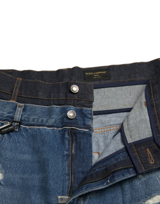 Blaue zerfetzte Baumwoll-Herrenjeans