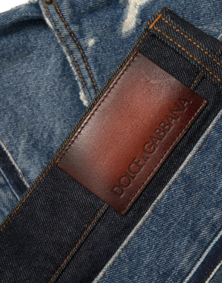 Blaue zerfetzte Baumwoll-Herrenjeans